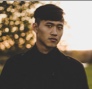 user profile picture of asian man wearing black